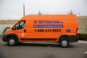 911-restoration-water-damage-mold-remediation-fire-damage-person-van